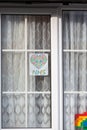 HARROW, UNITED KINGDOM - May 09, 2020: Children\'s drawing on house window with positive messages for the NHS workers during the