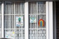 HARROW, UNITED KINGDOM - May 09, 2020: Children\'s drawing on house window with positive messages for the NHS workers during the