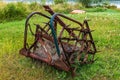 Harrows for leveling the ground after plowing. Vintage metal horse harrow for loosening the soil when plowing and sowing seeds iso