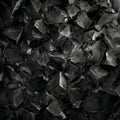 A harsh, dark abstract texture composed of sharp, angular, and jagged black obsidian-like fragments, creating a rugged Royalty Free Stock Photo