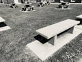 Harsh outdoor cement benches and table in black and white
