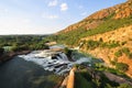 Hartbeespoort Dam and waterfall, Pretoria at sunset Royalty Free Stock Photo