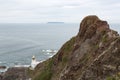 Hartland Point Lighthouse sitting on rocks at Devon`s coastline Royalty Free Stock Photo