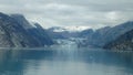 Harvard Glacier College Fjord Alaska Harvard Arm with Snow Covered Mountain Peaks and calm Pacific Ocean with Icebergs from a dist Royalty Free Stock Photo