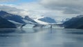 Harvard Glacier College Fjord Alaska Harvard Arm with Snow Covered Mountain Peaks and calm Pacific Ocean with Icebergs from a dist Royalty Free Stock Photo
