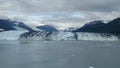 Harvard Glacier College Fjord Alaska Harvard Arm with Snow Covered Mountain Peaks and calm Pacific Ocean with Icebergs from a dist Royalty Free Stock Photo