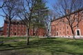 Harvard University Campus, ancient brick building and lawn in spring Royalty Free Stock Photo