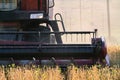 Harvester combine autumn graine wheat farmer worker plantation technology green field