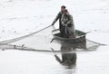 Harvest of fishpond. Royalty Free Stock Photo