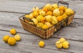 Harvest Japanese quince on a wooden table