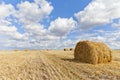 Harvest landscape with straw bales amongst fields in autumn Royalty Free Stock Photo