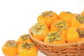 Harvest of persimmon fruit Royalty Free Stock Photo