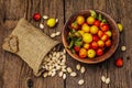 Harvest ripe cherry plum with seeds on wooden background Royalty Free Stock Photo