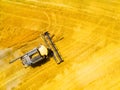 Harvest of wheat field. Aerial view to combine harvester. Royalty Free Stock Photo