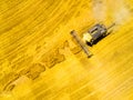 Harvest of wheat field. Aerial view to combine harvester. Royalty Free Stock Photo