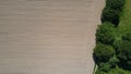 Harvested agricultural field from a bird's eye view - Drone shot Royalty Free Stock Photo