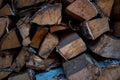 Harvested birch firewood is stacked in a neat woodpile Royalty Free Stock Photo