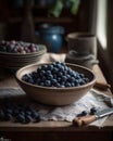 The harvested blueberries are placed in a bowl in the kitchen.