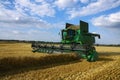 Harvester on agriculture field