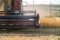 Harvester combine autumn graine wheat farmer worker plantation technology green field