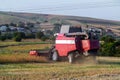 Harvester combine autumn graine wheat farmer worker plantation technology green field