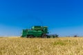 Harvester combine works on wheat or rye agricultural field