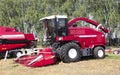 Harvester machine to harvest wheat field working. Combine agriculture harvesting golden ripe . Royalty Free Stock Photo