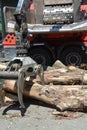 A harvester is a type of heavy forestry vehicle employed in cut-to-length logging operations for felling, delimbing and bucking Royalty Free Stock Photo