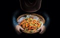 Harvesting baby carrot in dark from farmer