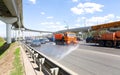 Harvesting equipment at the Moscow Ring Road MKAD. Royalty Free Stock Photo