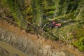 Harvesting in forest with fully automatic machine, top down aerial photo Royalty Free Stock Photo