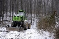 Harvesting in forest winter Royalty Free Stock Photo