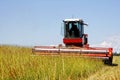 Harvesting A Grass Field for Hay Royalty Free Stock Photo