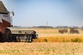 Harvesting peas with a combine harvester. Harvesting peas from the fields.