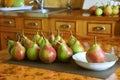 After harvesting. Ripe sweet pears on kitchen table. Concept of natural healthy food.