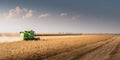 Harvesting of soy bean field with combine Royalty Free Stock Photo