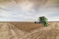 Harvesting of soybean field with combine Royalty Free Stock Photo