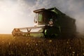 Harvesting of soybean field with combine Royalty Free Stock Photo