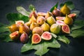 Harvesting - tasty organic figs on black background