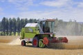 Harvesting Wheat with Claas Dominator 48S Combine Harvester Royalty Free Stock Photo