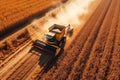 Harvesting wheat grain by combine harvester in field in summer. Aerial view top. Generative AI Royalty Free Stock Photo