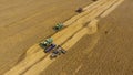 Harvesting wheat harvester. Agricultural machines harvest grain on the field.