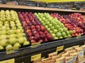 Harveys grocery store interior apples variety side view Royalty Free Stock Photo