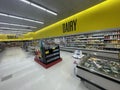 Harveys grocery store interior dairy area wide view
