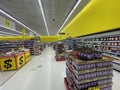 Harveys grocery store interior looking down back aisle Royalty Free Stock Photo