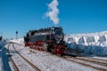 Harz national park Germany, Steam train on the way to Brocken through winter landscape, Famous steam train throught the