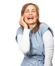 She has a great sense of humour. Studio portrait of a gorgeous mature woman smiling at the camera.