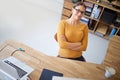 She has her eyes on success. High angle portrait of a smiling young female designer sitting at her desk in an office. Royalty Free Stock Photo