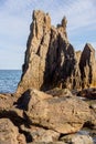 Hashigui Rocks amazing stone formations in Kushimoto Town in Kii Peninsula of Wakayama Prefecture in Japan Royalty Free Stock Photo