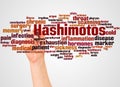 Hashimotos word cloud and hand with marker concept Royalty Free Stock Photo
